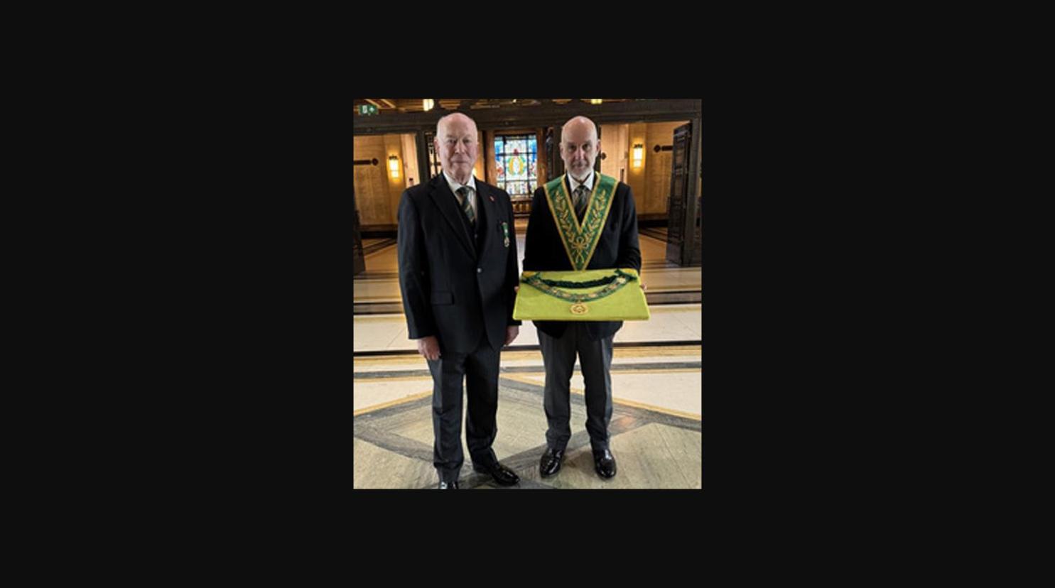 R.W. Bro. Colin Woodcock MBE being invested as Deputy Grand Master at Freemasons' Hall